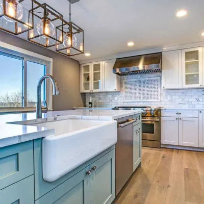 a kitchen with white cabinets
