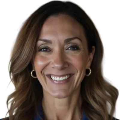Smiling middle-aged woman with wavy brown hair wearing gold hoop earrings and a blue blazer