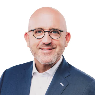 Professional man with a blue blaser and glasses
