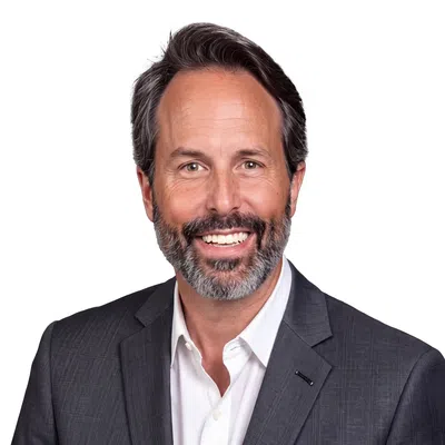 Professional man with a gray blaser and white shirt