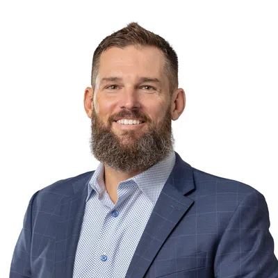 Professional man with a blue blaser and beard