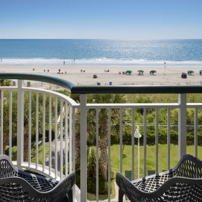 a deck overlooking a beach