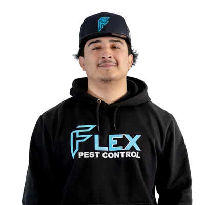 Man wearing black hoodie and cap with Flex Pest Control logo on white background