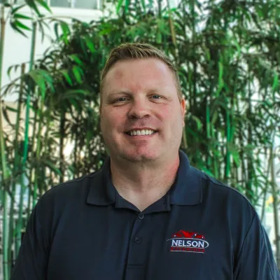 a man smiling for the camera