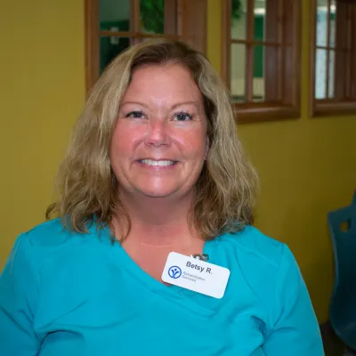 Tina Boomerina AKA Christina Gregoire in a blue shirt