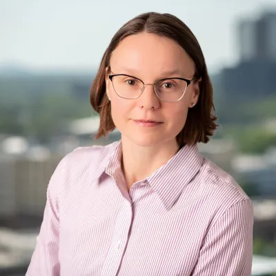 a woman wearing glasses