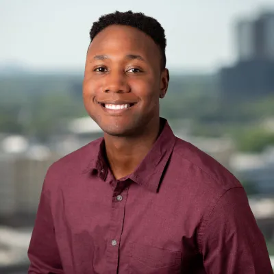 a man smiling for the camera