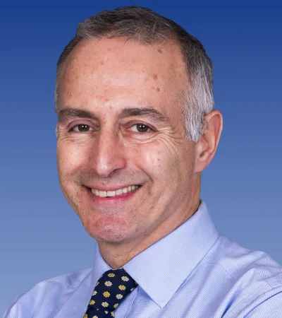 a man wearing a blue shirt and a tie