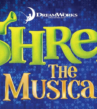 Shrek The Musical logo with green ogre ears integrated into the text on a blue textured background.