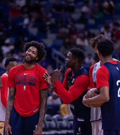 a group of men in sports uniforms
