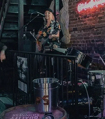 a group of people playing instruments