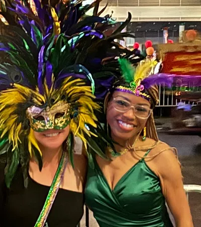 a couple of women wearing clothing
