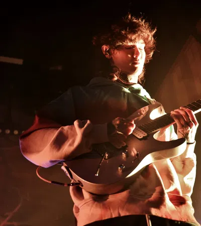 a person playing a guitar