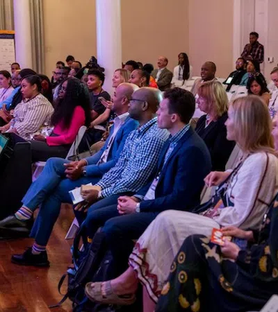 a group of people sitting in a room