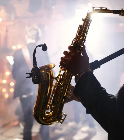 a man playing a saxophone
