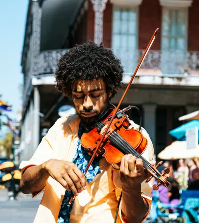 a man playing a violin