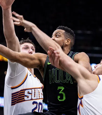 a basketball player dribbling the ball