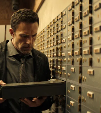 a man looking at a computer