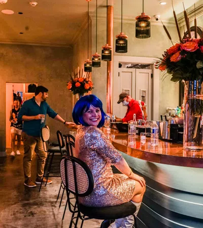 a person sitting at a bar