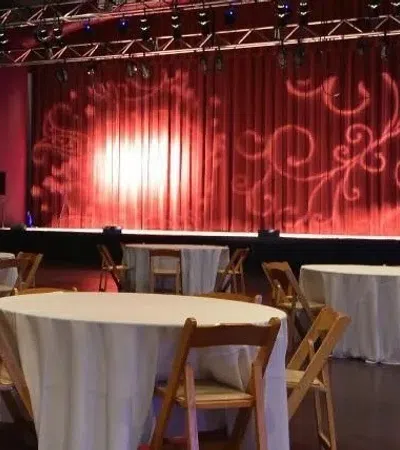 a room with tables and chairs
