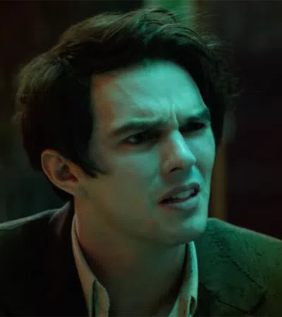 Nicholas Hoult looking to the side