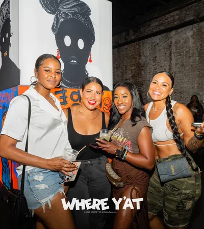 a group of women posing for a photo