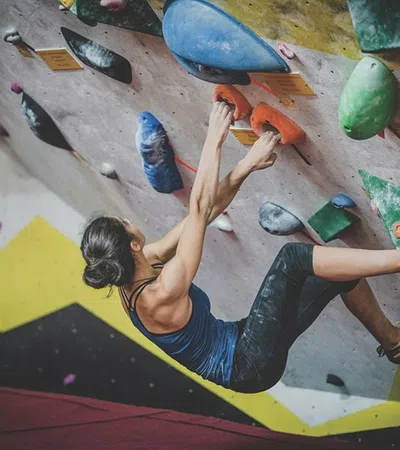 a boy on a climbing wall
