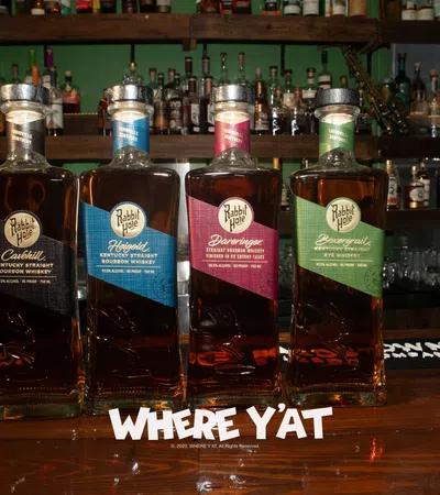 a group of bottles on a bar