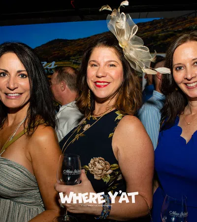 a group of women posing for a photo