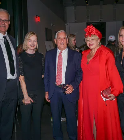 Walter Isaacson et al. posing for a photo