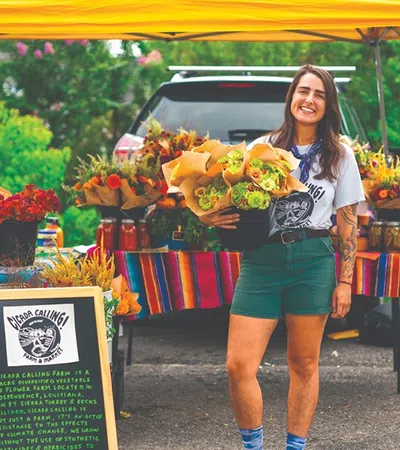 a person holding a basket of fruit