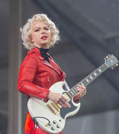 a person playing a guitar