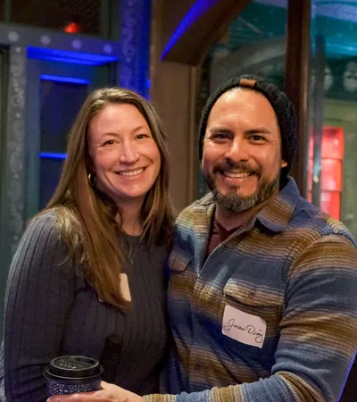 a man and woman posing for a picture