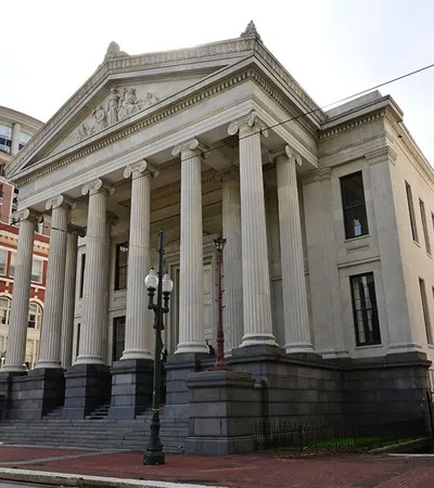 a building with columns and a walkway