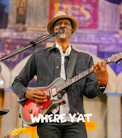a person playing a guitar