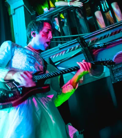 a person playing a guitar