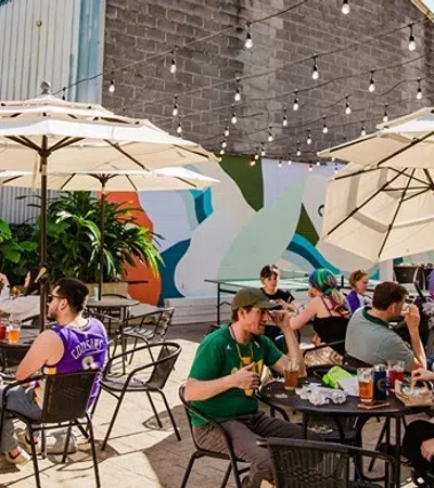 a group of people sitting at tables