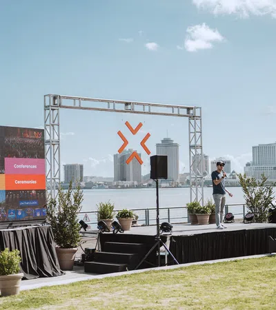 a person standing on a stage