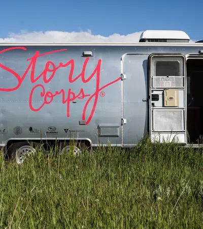 a trailer with a red and white logo on it