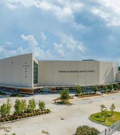 Aerial view of Franklin Avenue Baptist Church showcasing modern architecture and landscaping.