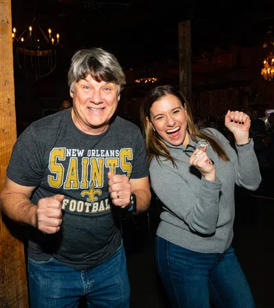 a man and woman posing for a picture