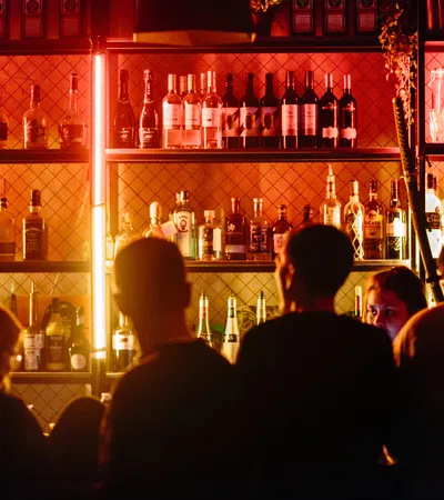 a group of people in a bar