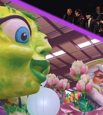 a group of people in a room with balloons and a person in a garment