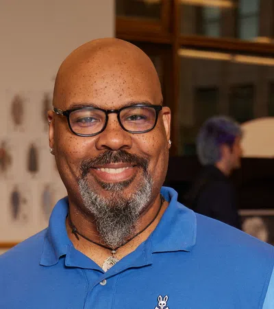 James Monroe Iglehart wearing glasses