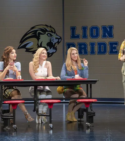 a group of women sitting at tables