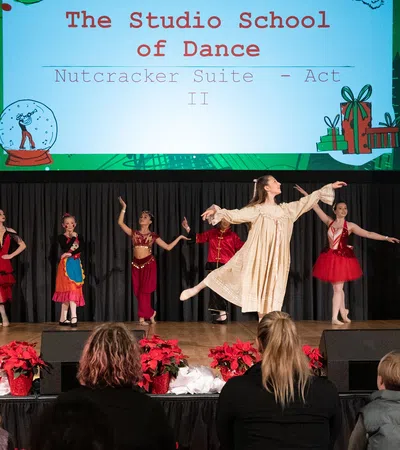 a group of people performing on a stage
