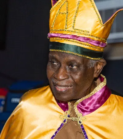 a person wearing a colorful headdress
