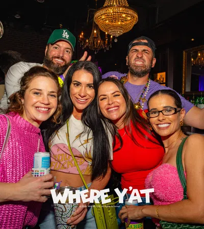 a group of people posing for a photo