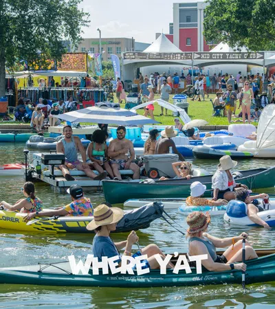 a group of people on boats