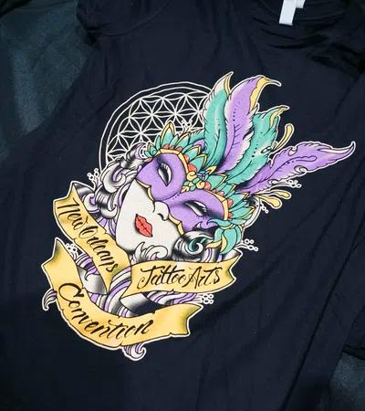 a blue shirt with a graphic design on it